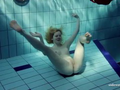 ChiliMovies presents: Blonde goes for a swim and strips