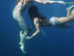 ChiliMovies presents: Bikini girls swim in the ocean and strip