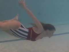 ChiliMovies presents: Leggy girl swims and strips naked in pool