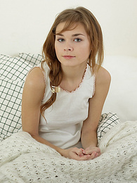 Chili Movies presents: Sweet teen brunette stripping naked in the bed