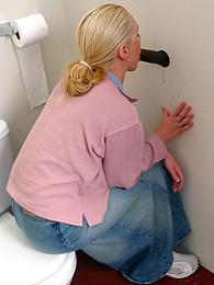 Chili Movies presents: Blonde girl Jamie sits on the toilet and blows a black gloryhole dong
